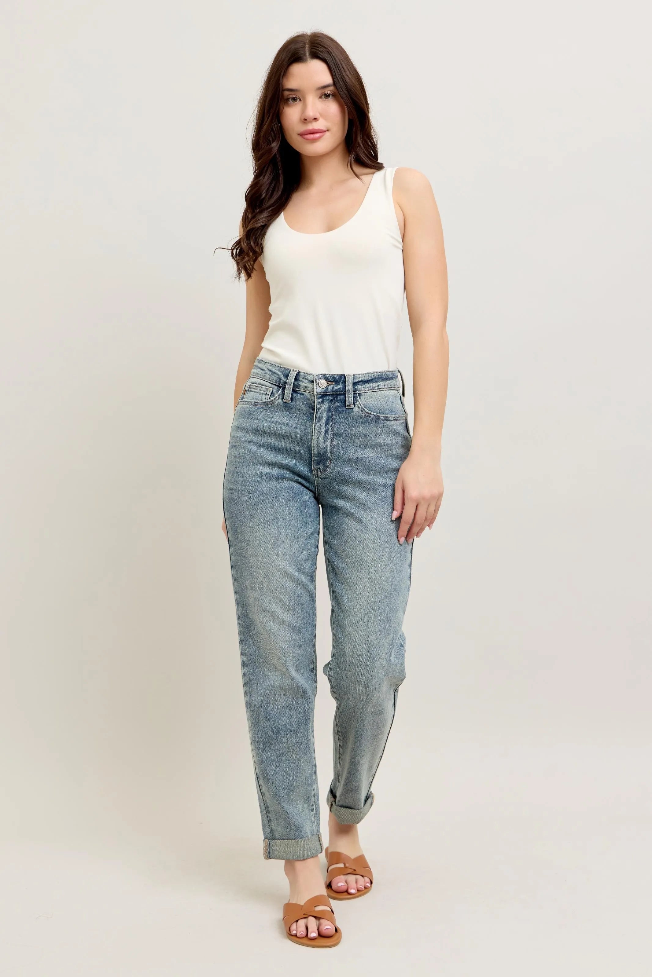 Light blue vintage-wash jeans with double roll cuff and relaxed straight fit