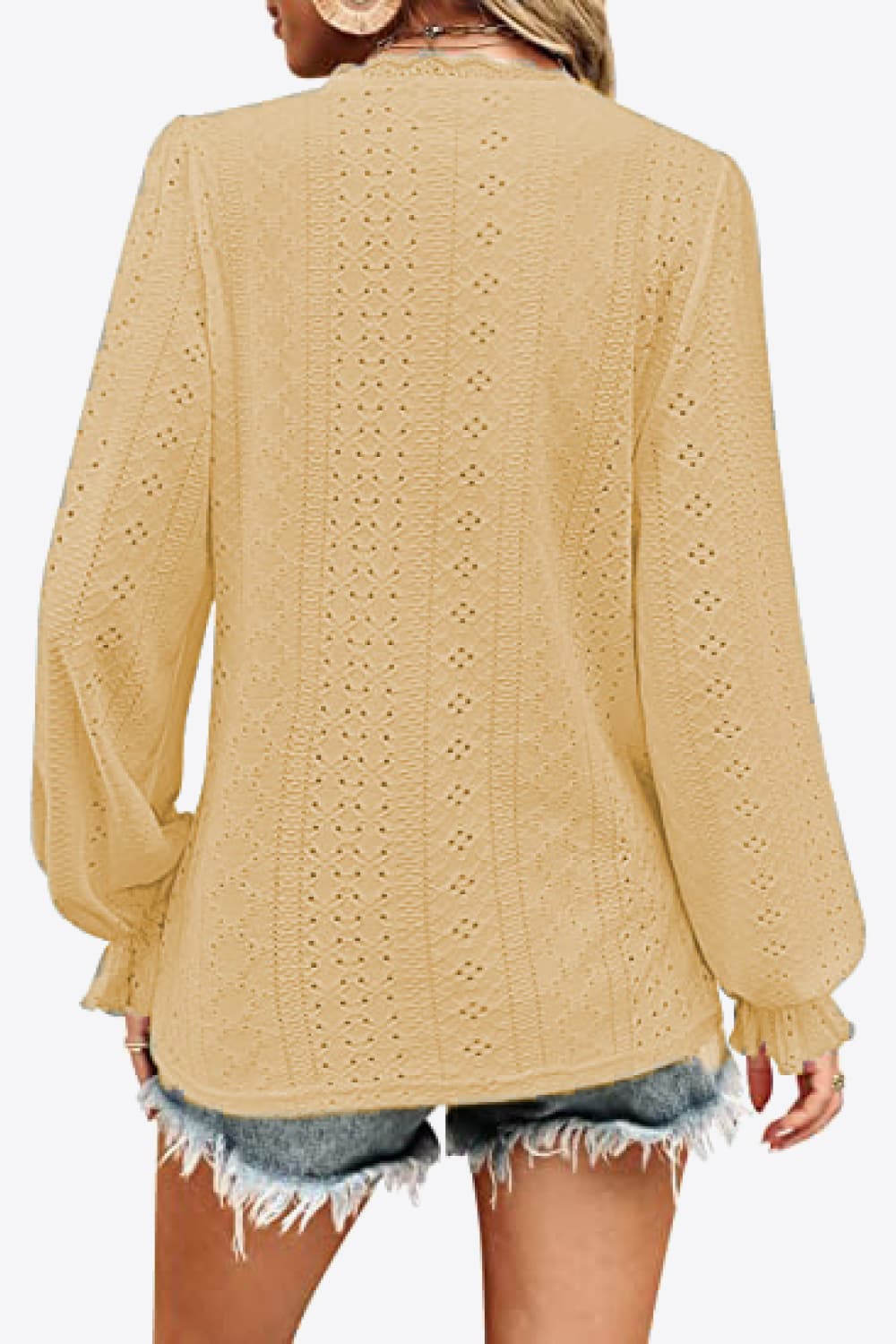 Gold eyelet blouse back view with long gathered cuffs