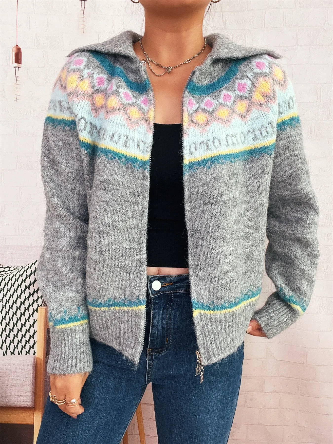 Gray Fair Isle zip-up cardigan with hooded collar and colorful stripe bands