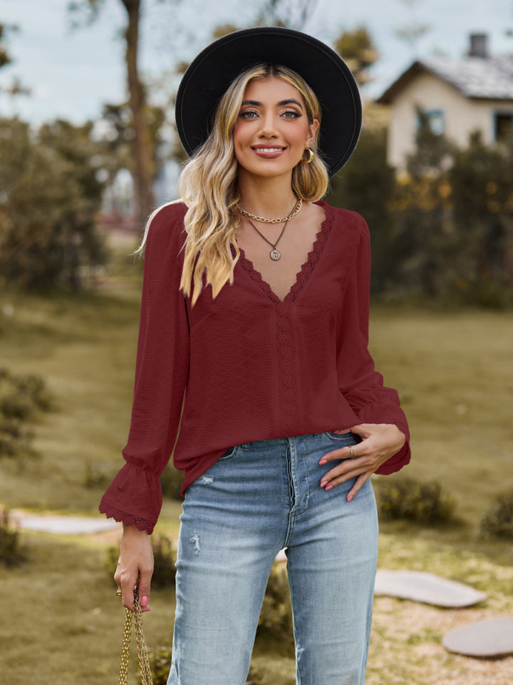 V-neck flounce-sleeve blouse in wine red, front view with ruffled V-neck