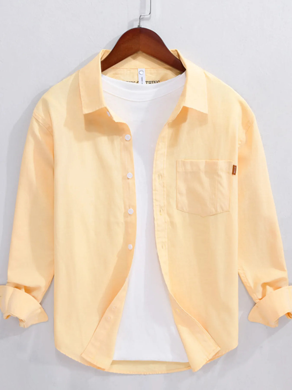 Men's cotton button-up long sleeve shirt, light tan, front pocket and button placket