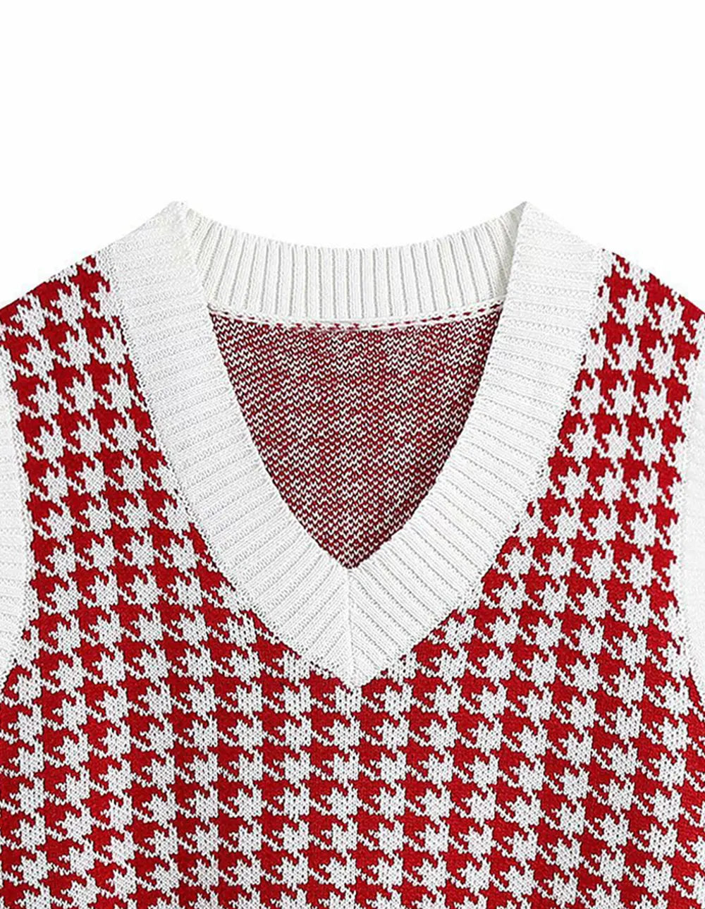 Red-and-white houndstooth V-neck sweater vest with ribbed neckline trim