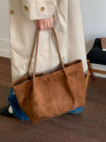 Brown suede large tote bag with double top handles and open top