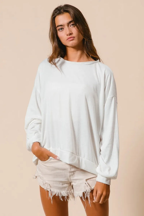 Ivory crewneck terry pull-over with long sleeves and relaxed fit
