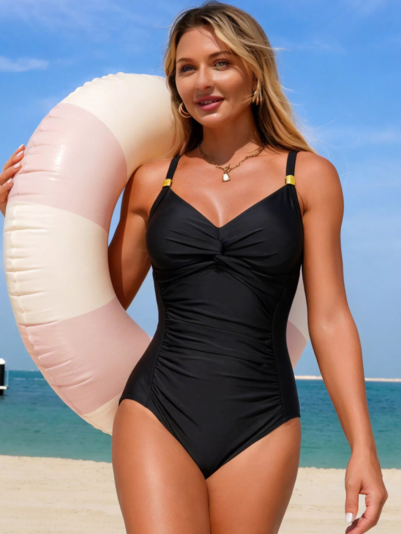 Ruched Twist Front One-Piece Swimsuit in black with gold strap hardware