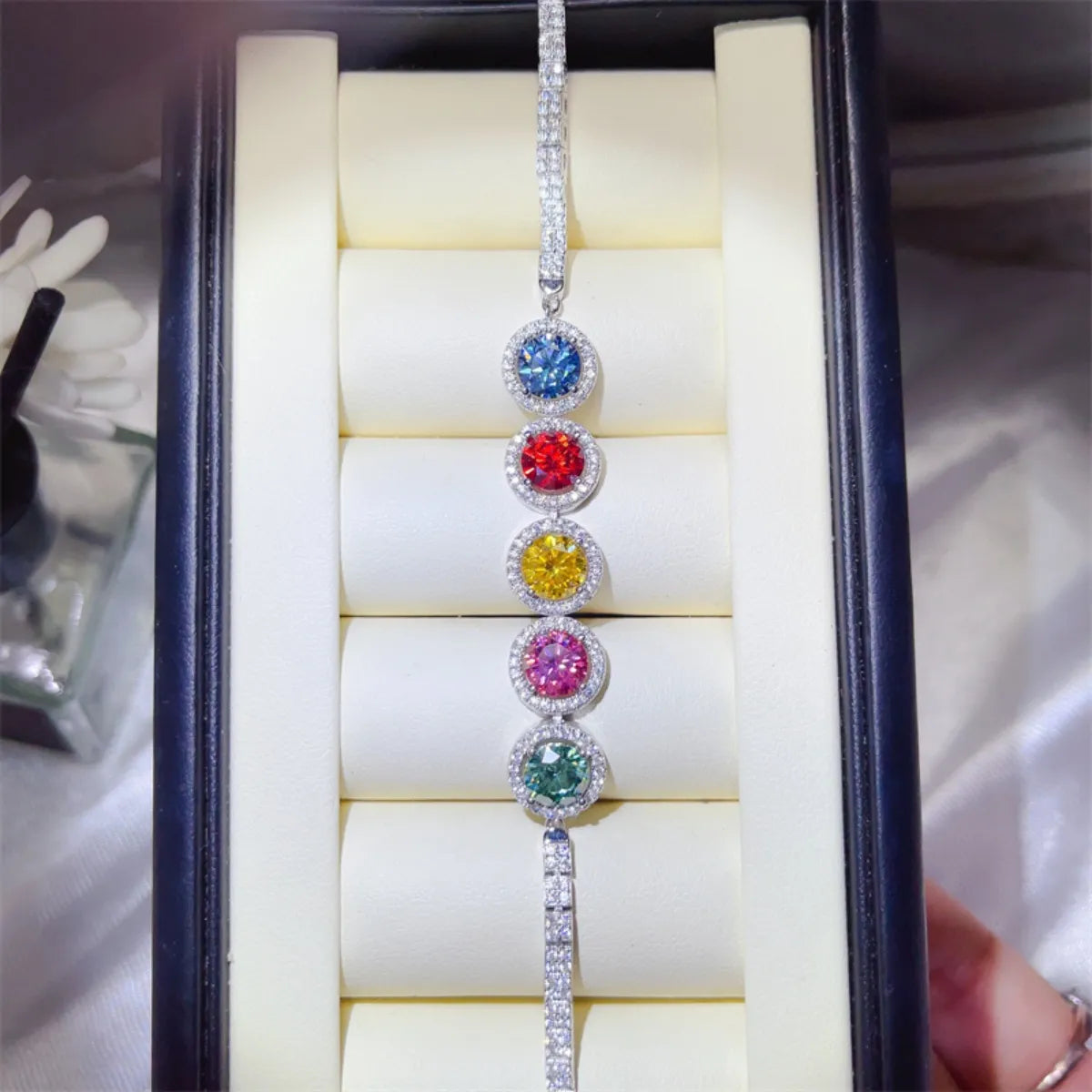 925 sterling silver multicolor gemstone bracelet on jewelry display stand