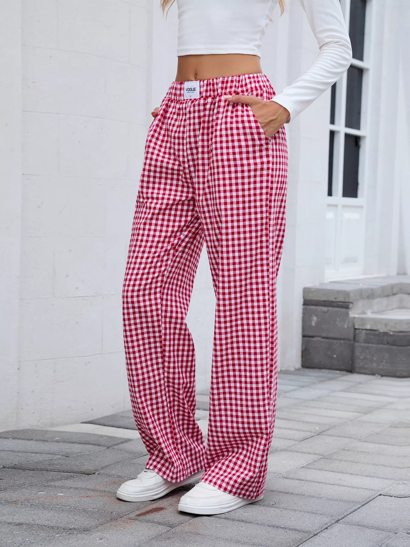 Plaid wide-leg casual pants in red and white, back view with relaxed wide legs.