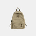 Khaki cotton zip backpack with adjustable shoulder straps and front pocket