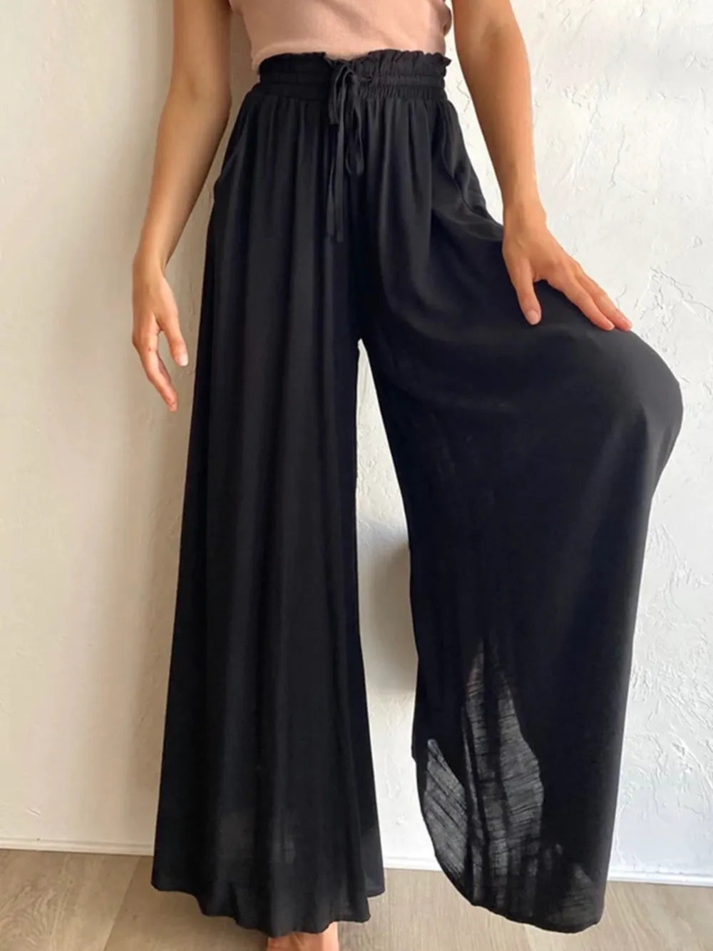 High waist wide leg pants in dark navy with elastic waistband and billowy wide legs