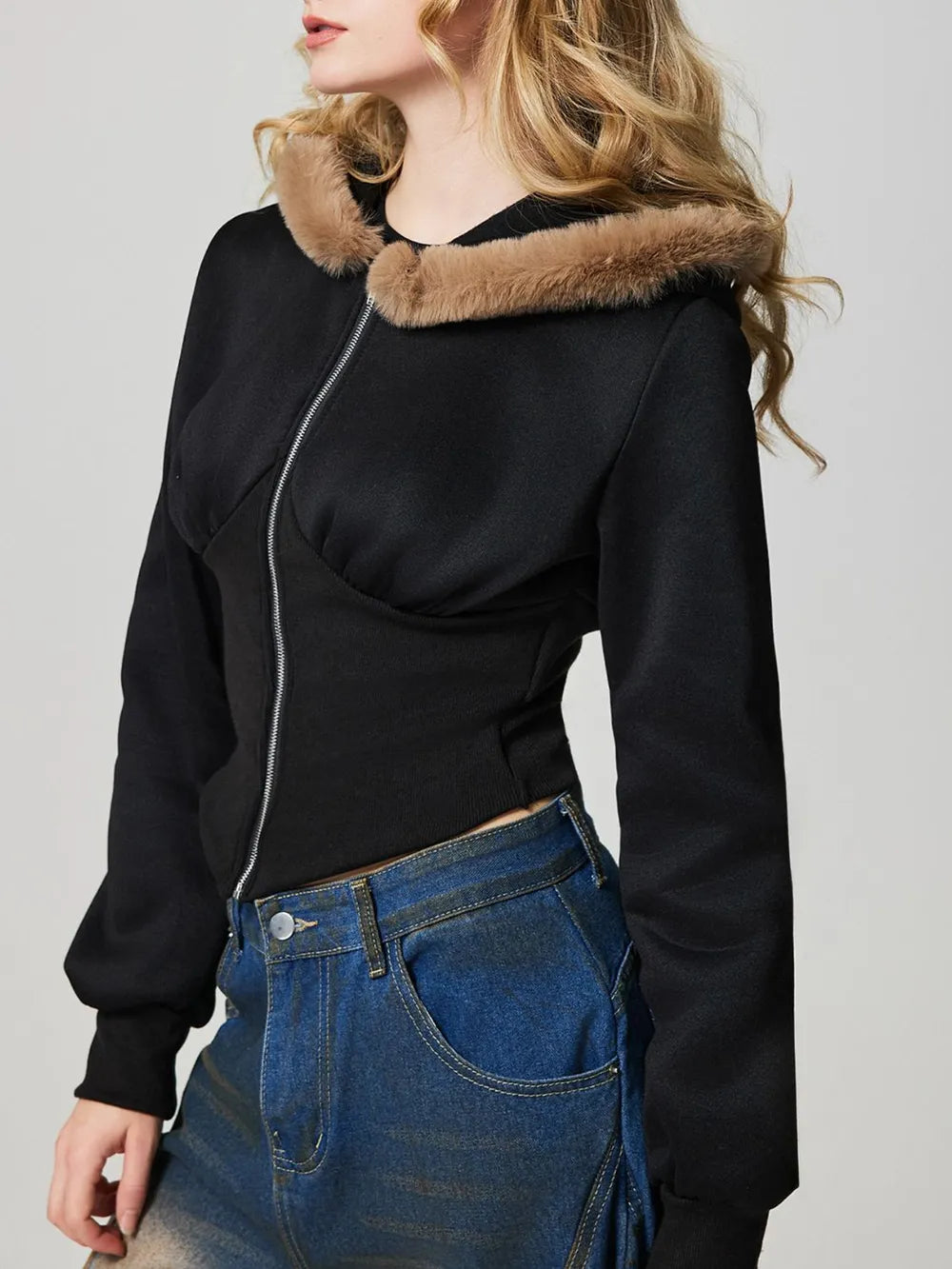Black hooded zip-up jacket with fuzzy collar trim and long sleeves, front zipper, waist length.