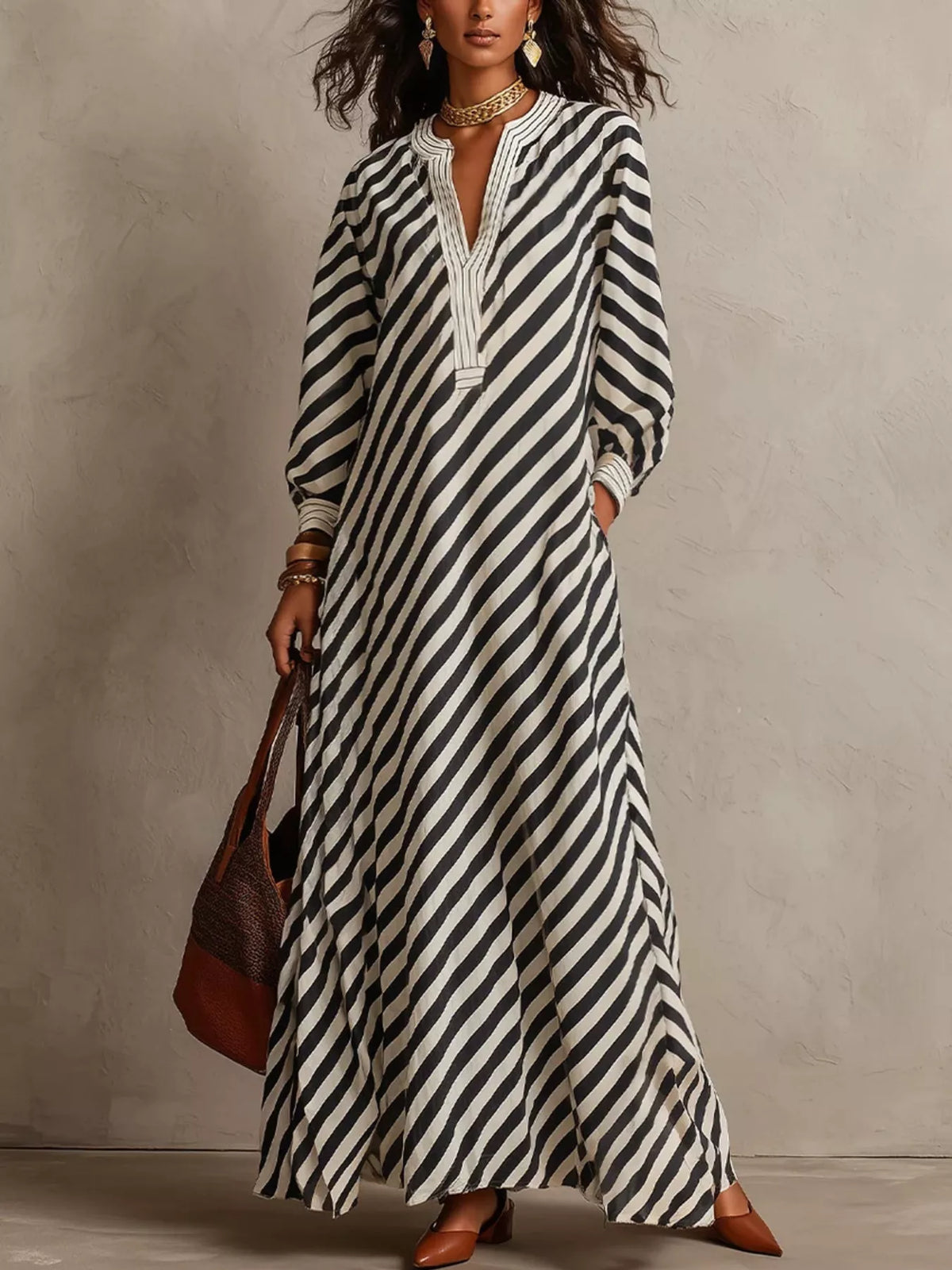 Black-and-white striped long-sleeve maxi dress with V-neck and button front