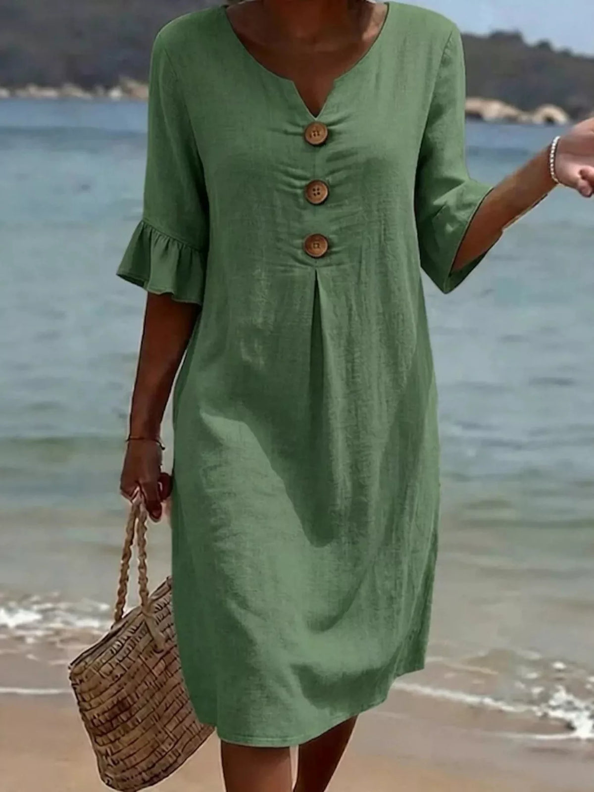 Green V-neck button-front midi shift dress with ruffle sleeves and three wood-tone buttons