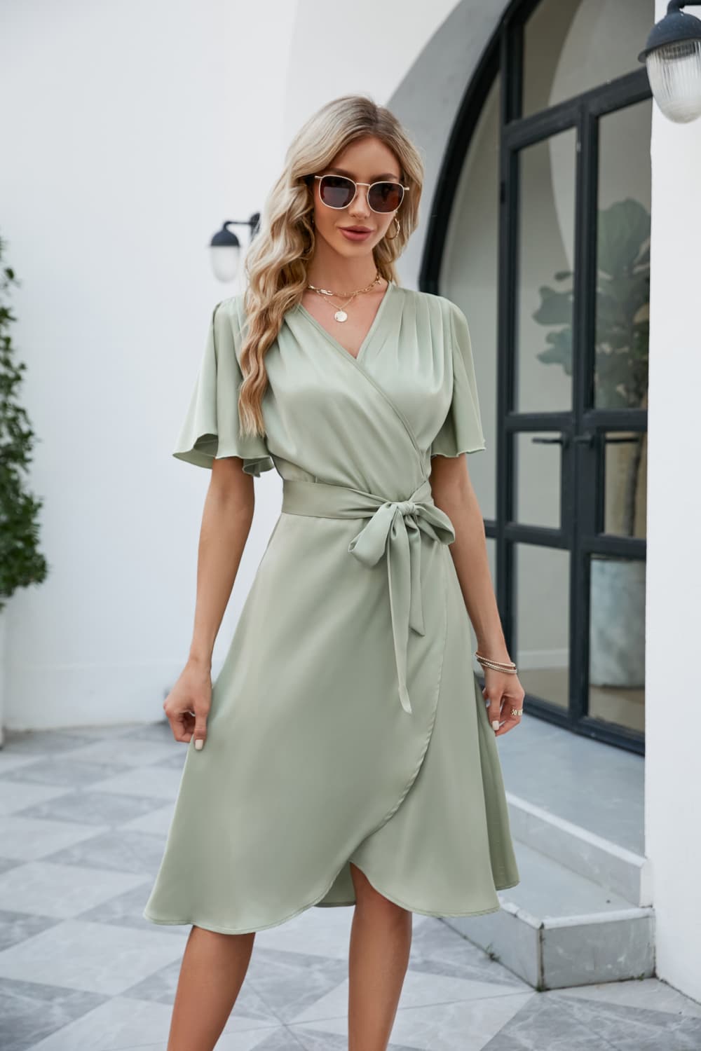 Sage green tie-waist surplice flutter sleeve dress, short V-neck wrap front
