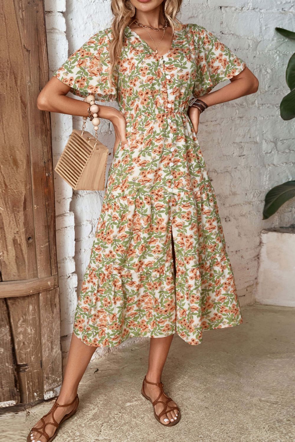 Floral V-neck midi dress with puff sleeves and front slit