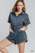 Navy button-front charmeuse romper with short sleeves and gathered waist