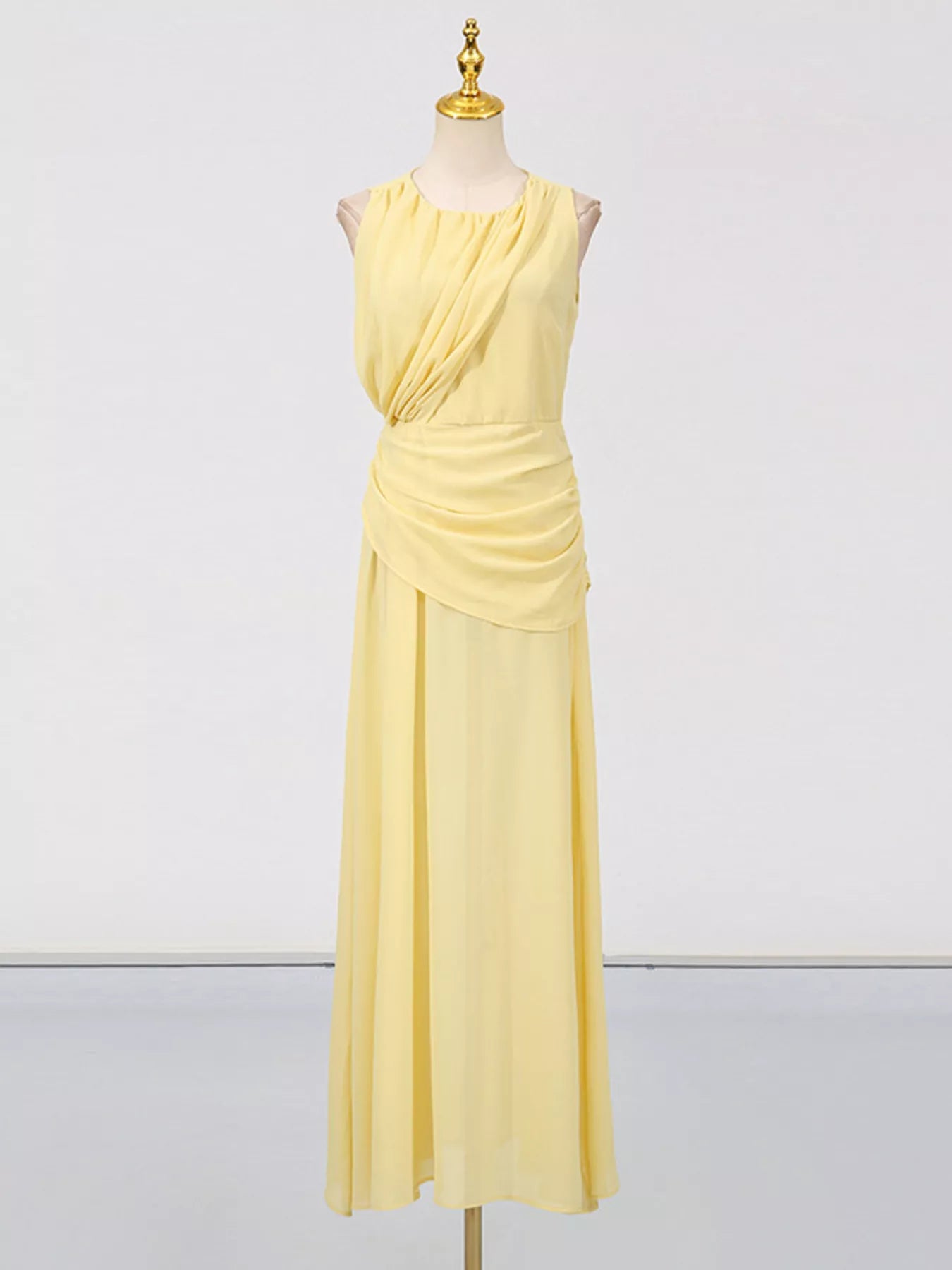 Cedar & Moore Sleeveless pale yellow ruched maxi dress with draped wrap-waist detail
