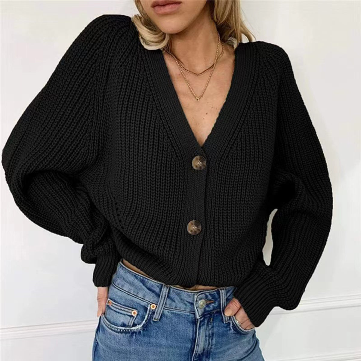 Black knit V-neck button-front long sleeve cardigan with gold-tone buttons