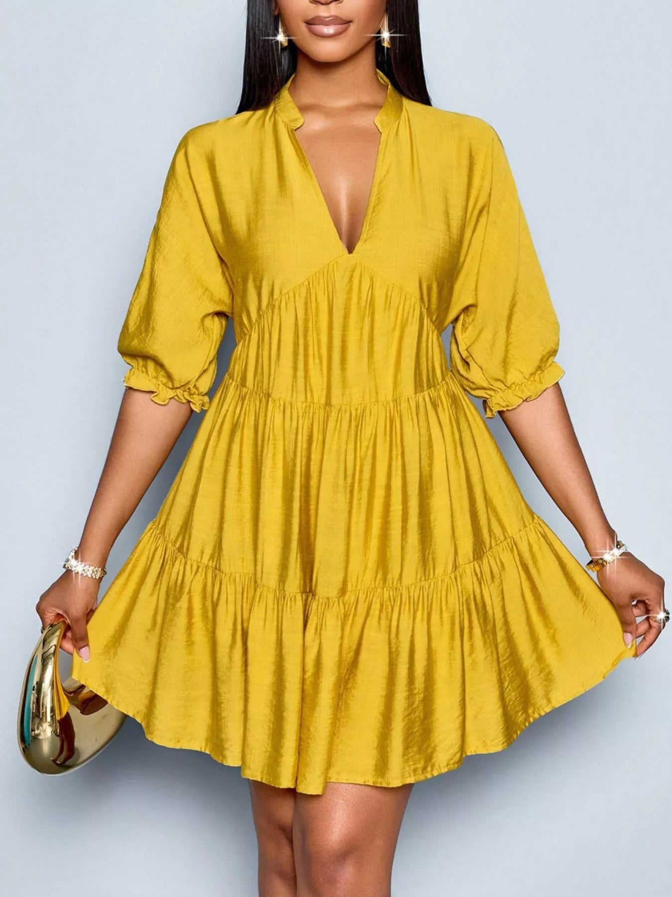 Notched half sleeve tiered dress in yellow with V neckline and puff sleeves