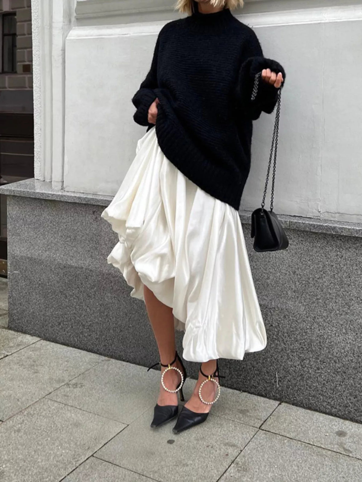 White satin maxi skirt with back zipper and ruffled, layered hem
