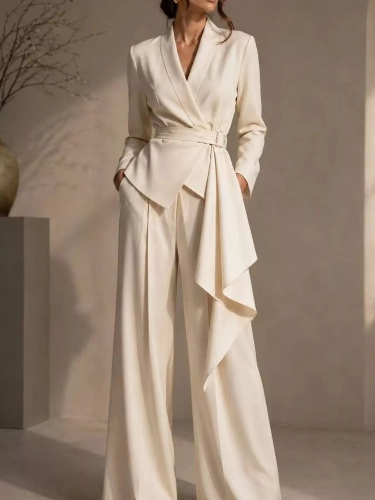 Light beige wrap-style blazer with waist tie and wide-leg pants set