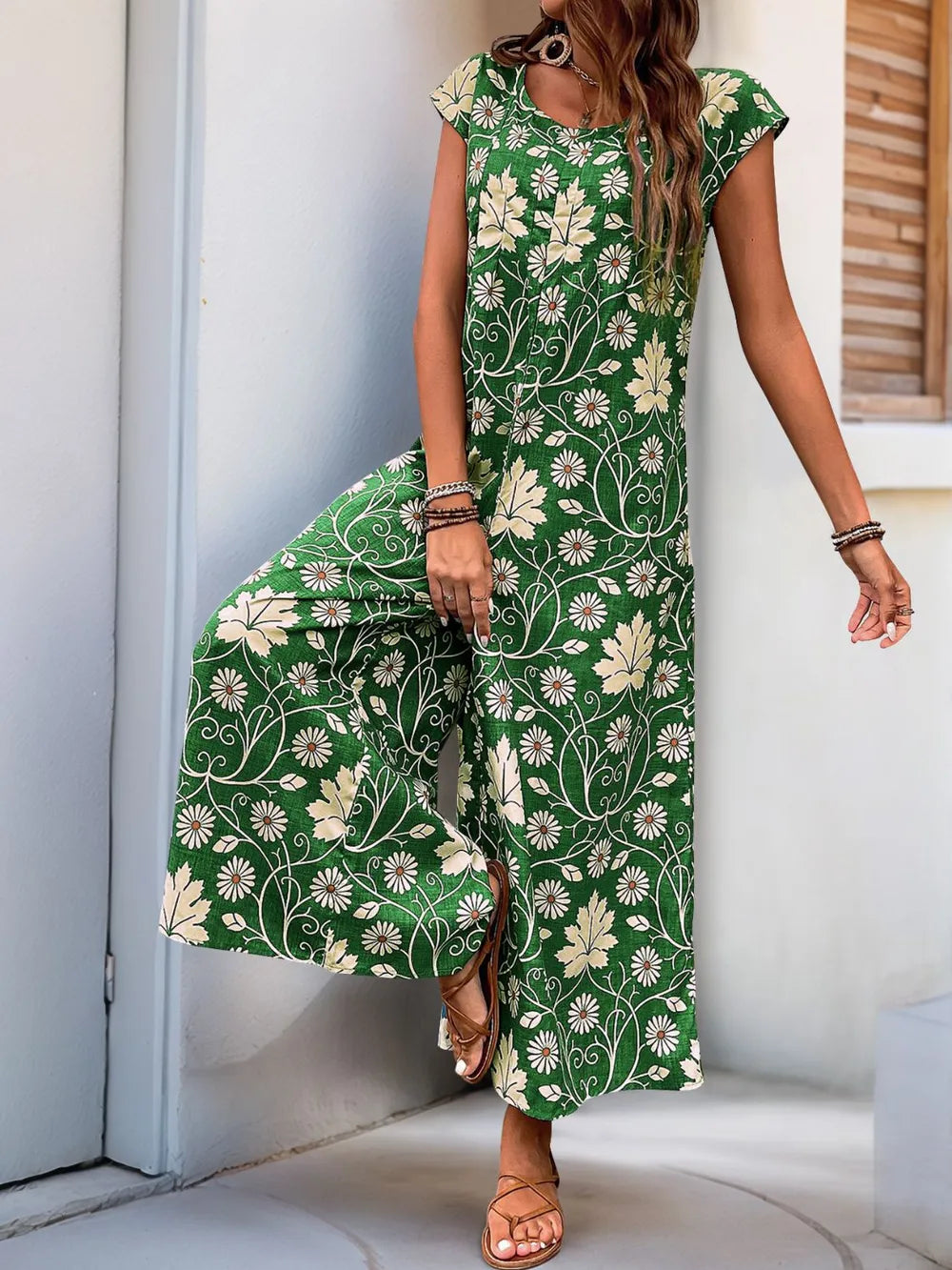 Green printed wide-leg jumpsuit with round neckline and cap sleeves