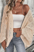 Tan open-front knit cardigan with long sleeves and openwork lace pattern