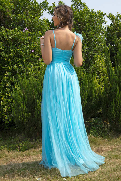 Aqua ruched maxi dress with open back, thin straps, and flowing tulle skirt