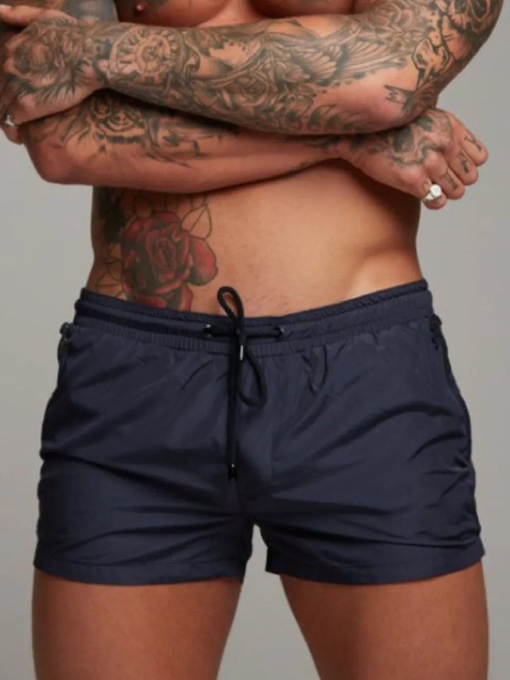 Men's active shorts in navy with drawstring ties and side pockets