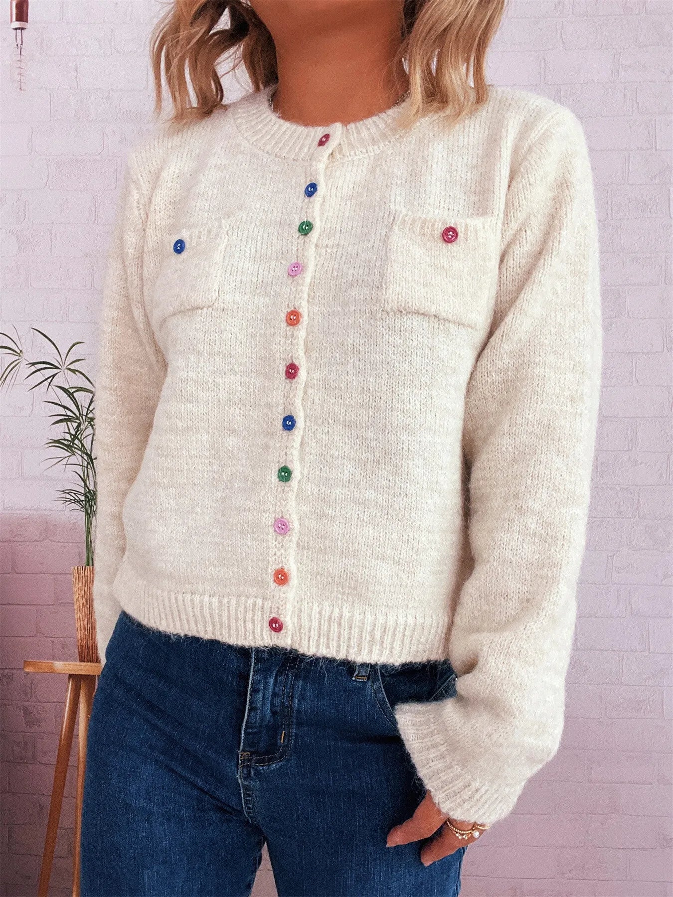 Cream ribbed hem cardigan with chest pocket, multicolor button front, long sleeves