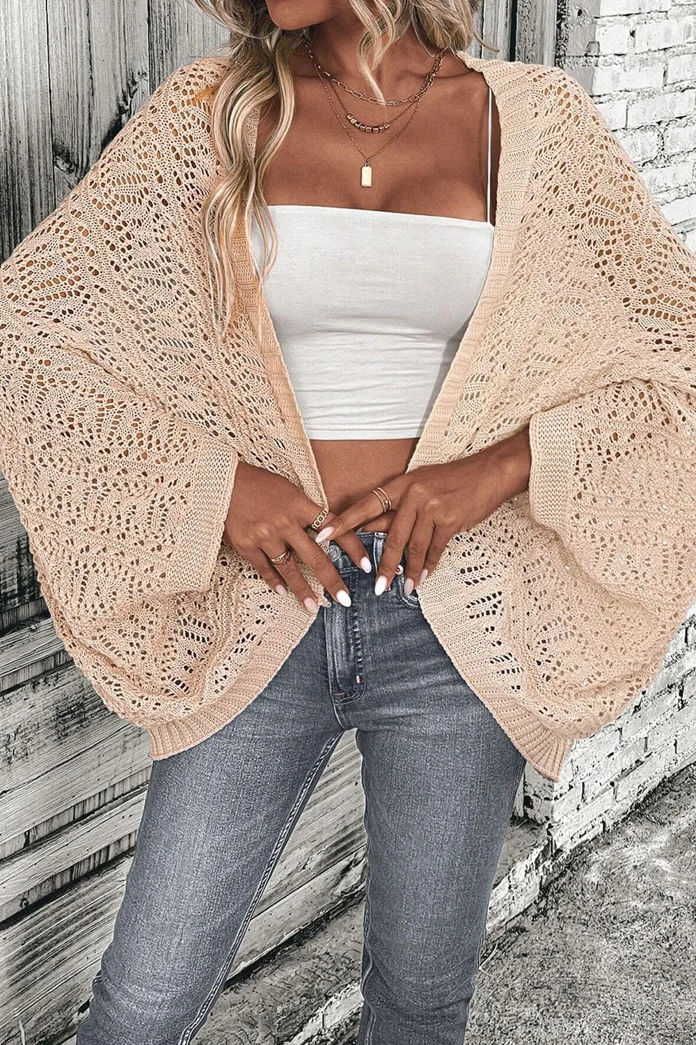 Tan open-front long-sleeve cardigan with chunky openwork knit texture