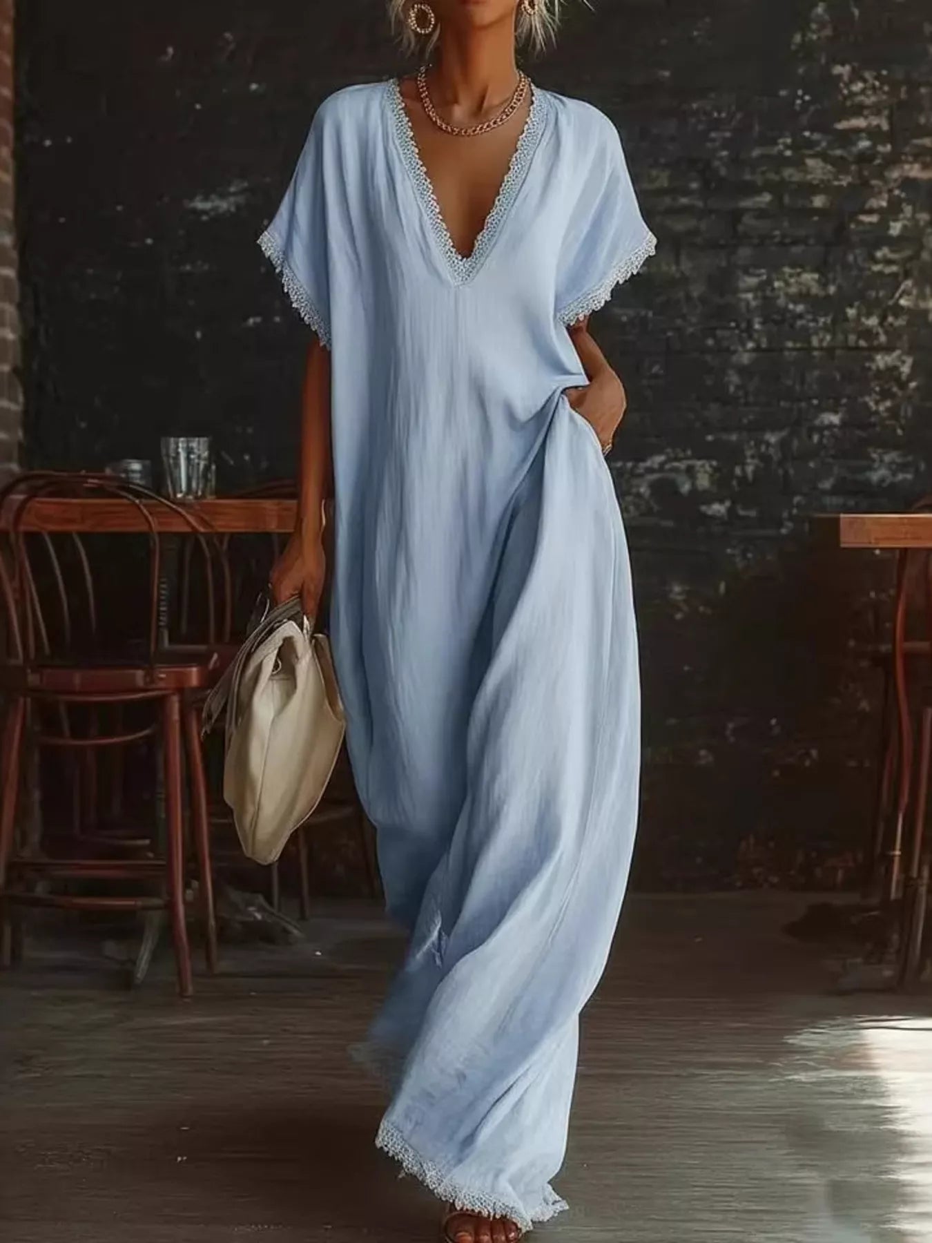 Sky blue lace-trim V-neck maxi dress, short flutter sleeves and flowing maxi hem.
