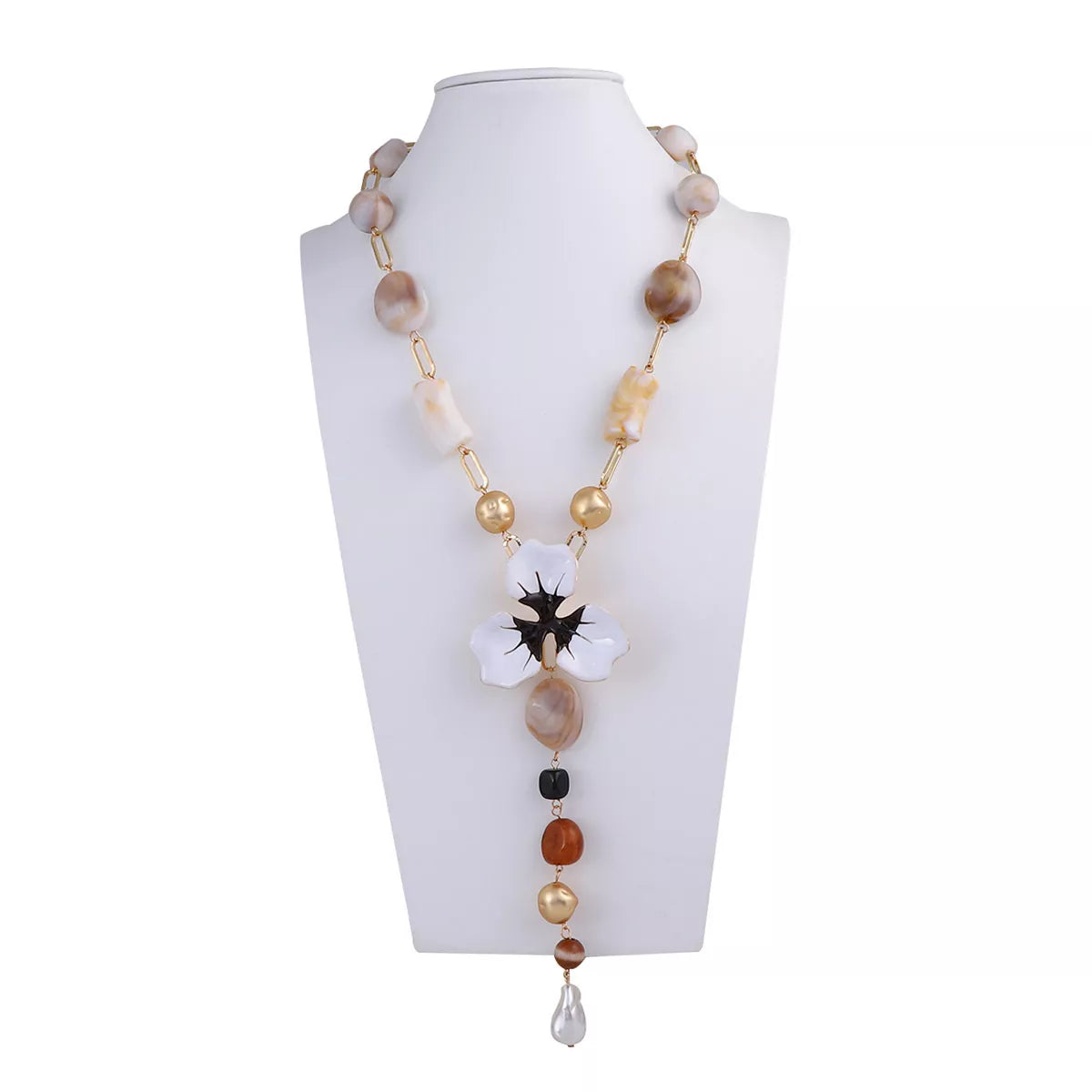 Y-shaped flower pendant necklace with white petals, black center, and pearl bead drops
