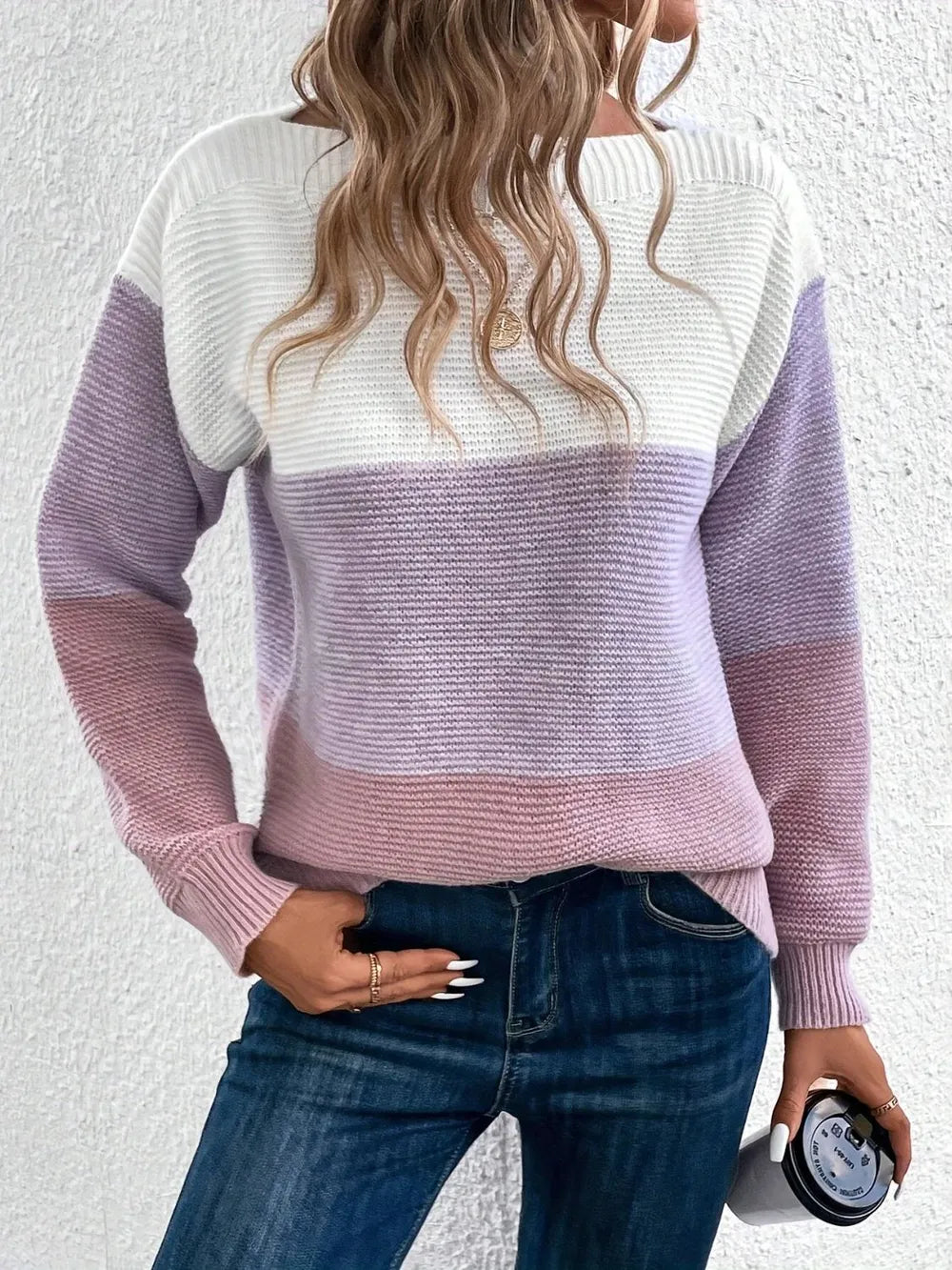 Color block knit sweater in white and lilac/pink, boat neck, long sleeves.