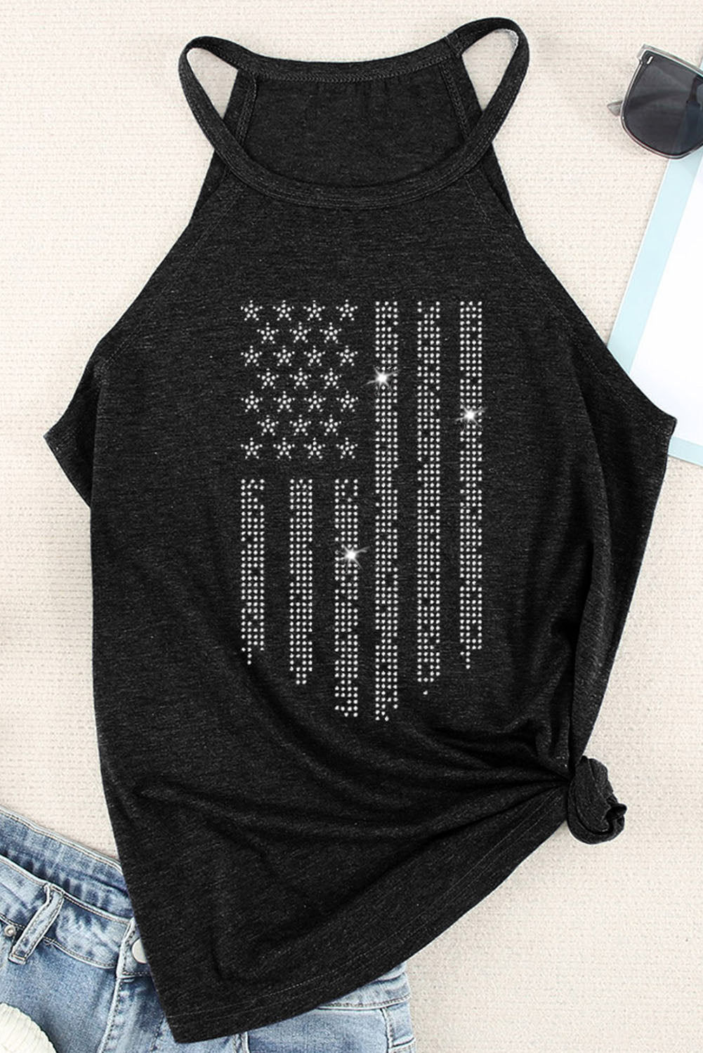 Black halter neck tank top with star-and-bar graphic and knotted side hem