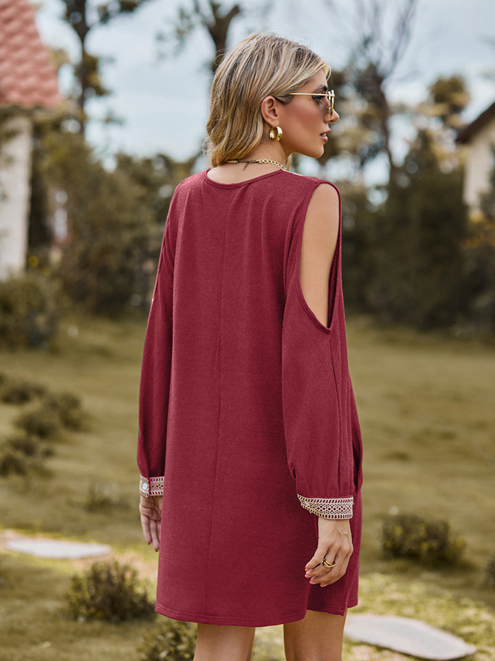 Wine V-neck cutout sleeve mini dress, back view with cutout shoulder detail
