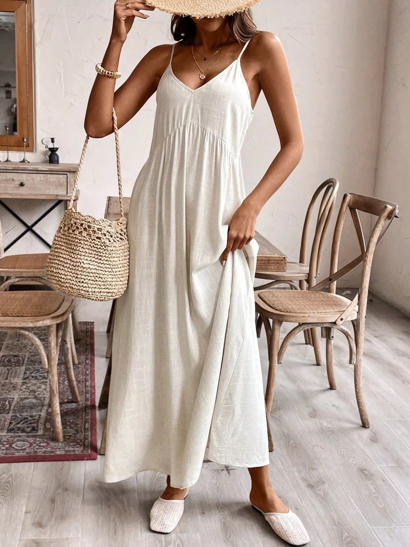 Cream spaghetti strap maxi dress with V-neck and gathered neckline