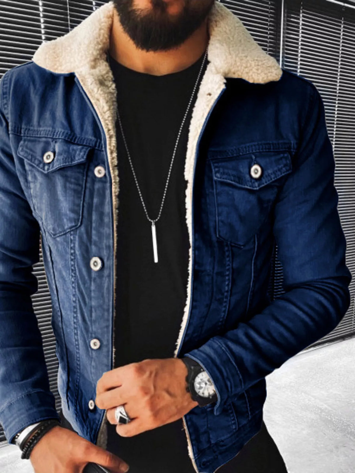 Blue denim jacket with beige sherpa lining, button front and chest pockets