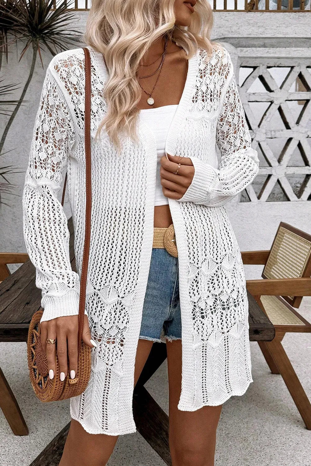 White open-front long sleeve openwork cardigan with long tunic crochet hem