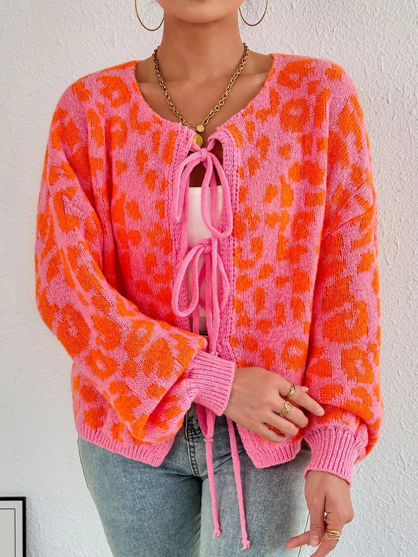 Leopard tie-front cardigan, orange knit with pink drawstring center front