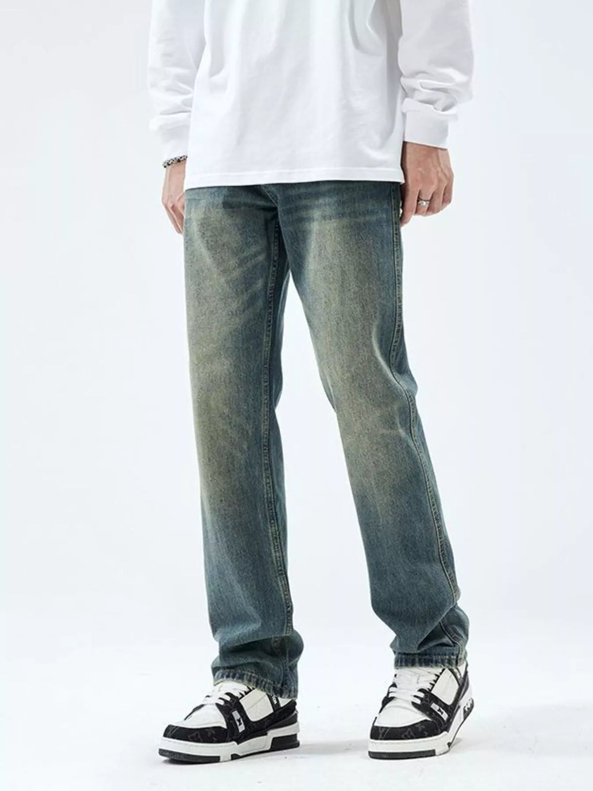 Men's slim-fit washed stretch jeans in vintage blue, front view with belt loops