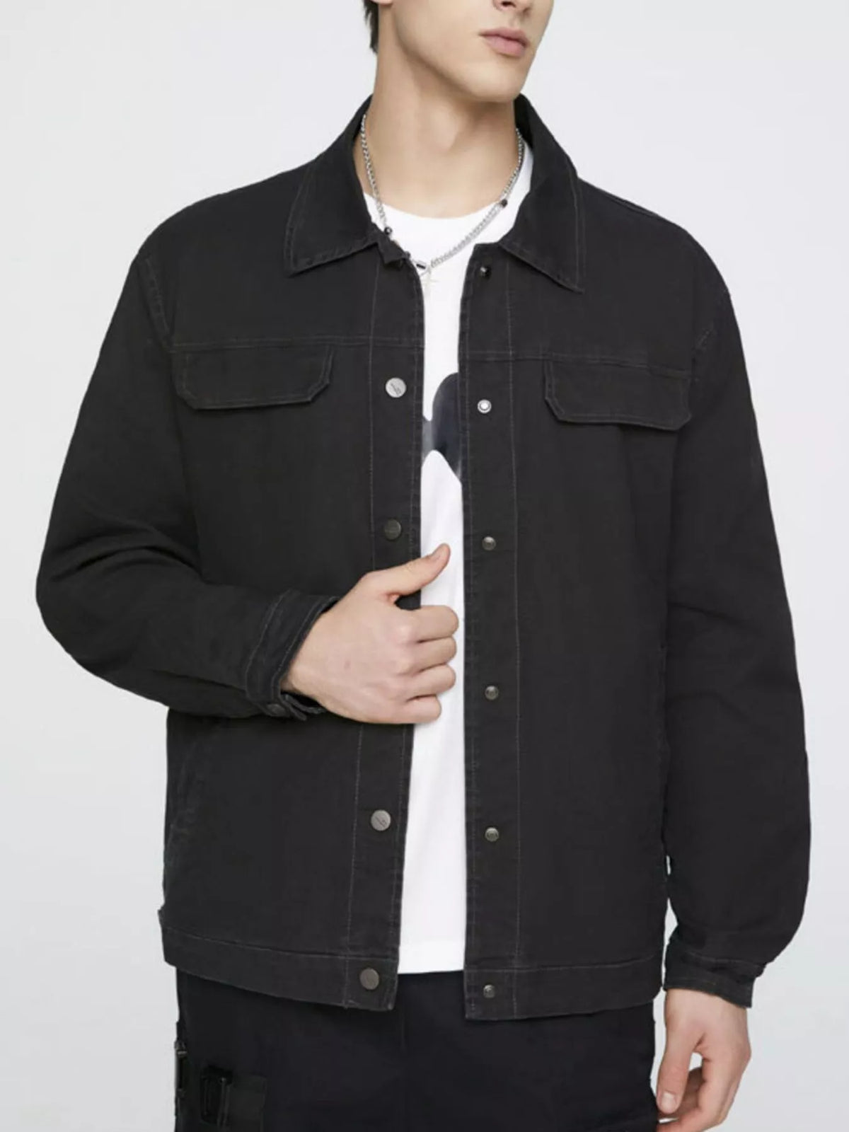 Men's black cotton button-up jacket with two chest pockets and snap buttons