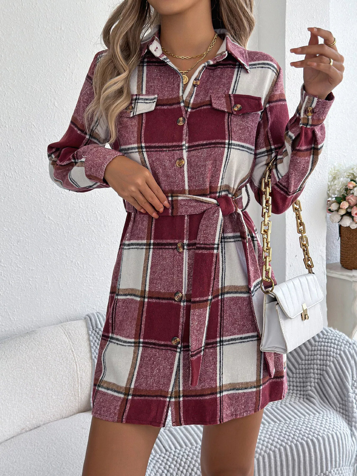 Burgundy plaid belted button shirt dress with collar, long sleeves, and tie waist belt.