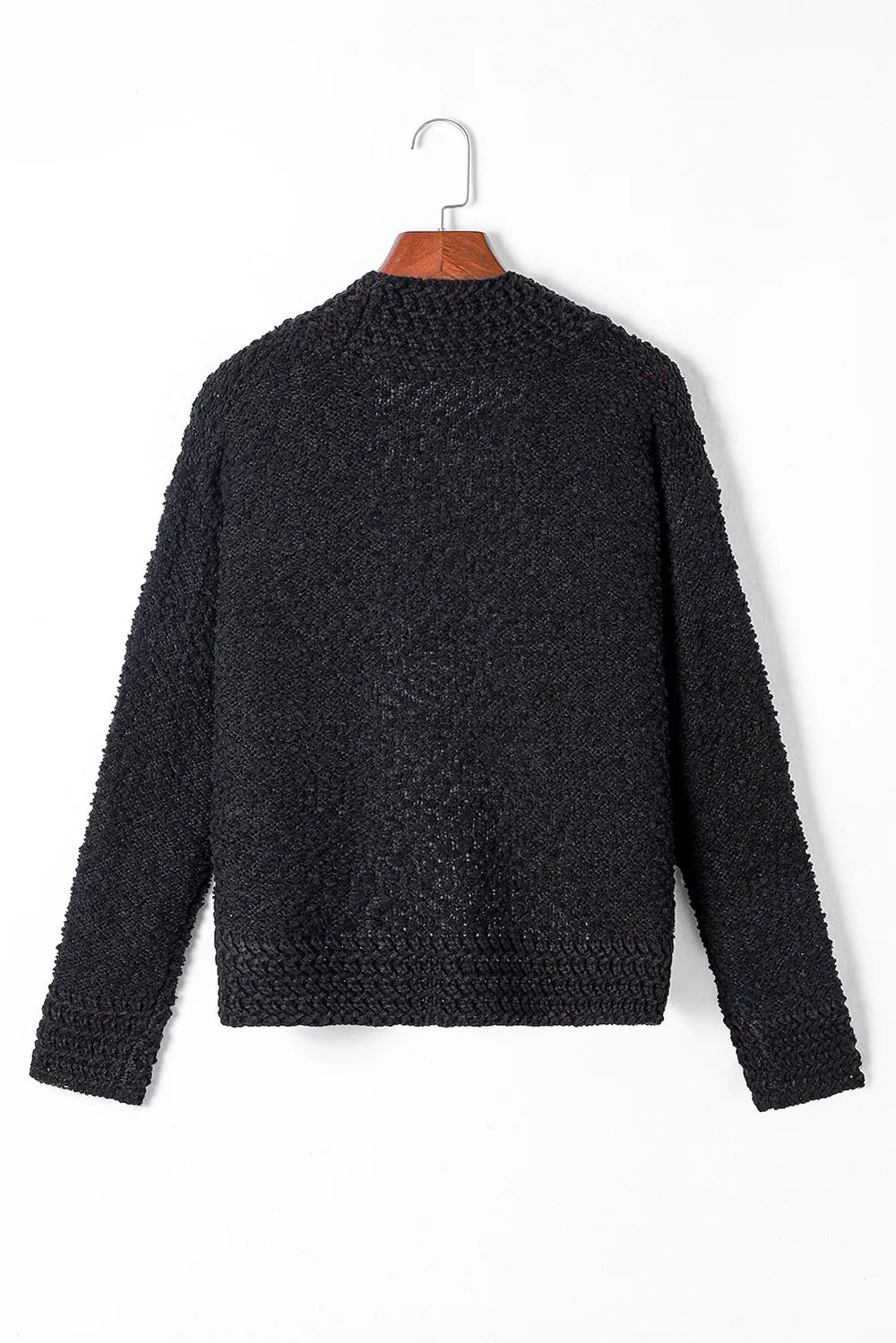 Black solid open-front cardigan back view on hanger, textured knit