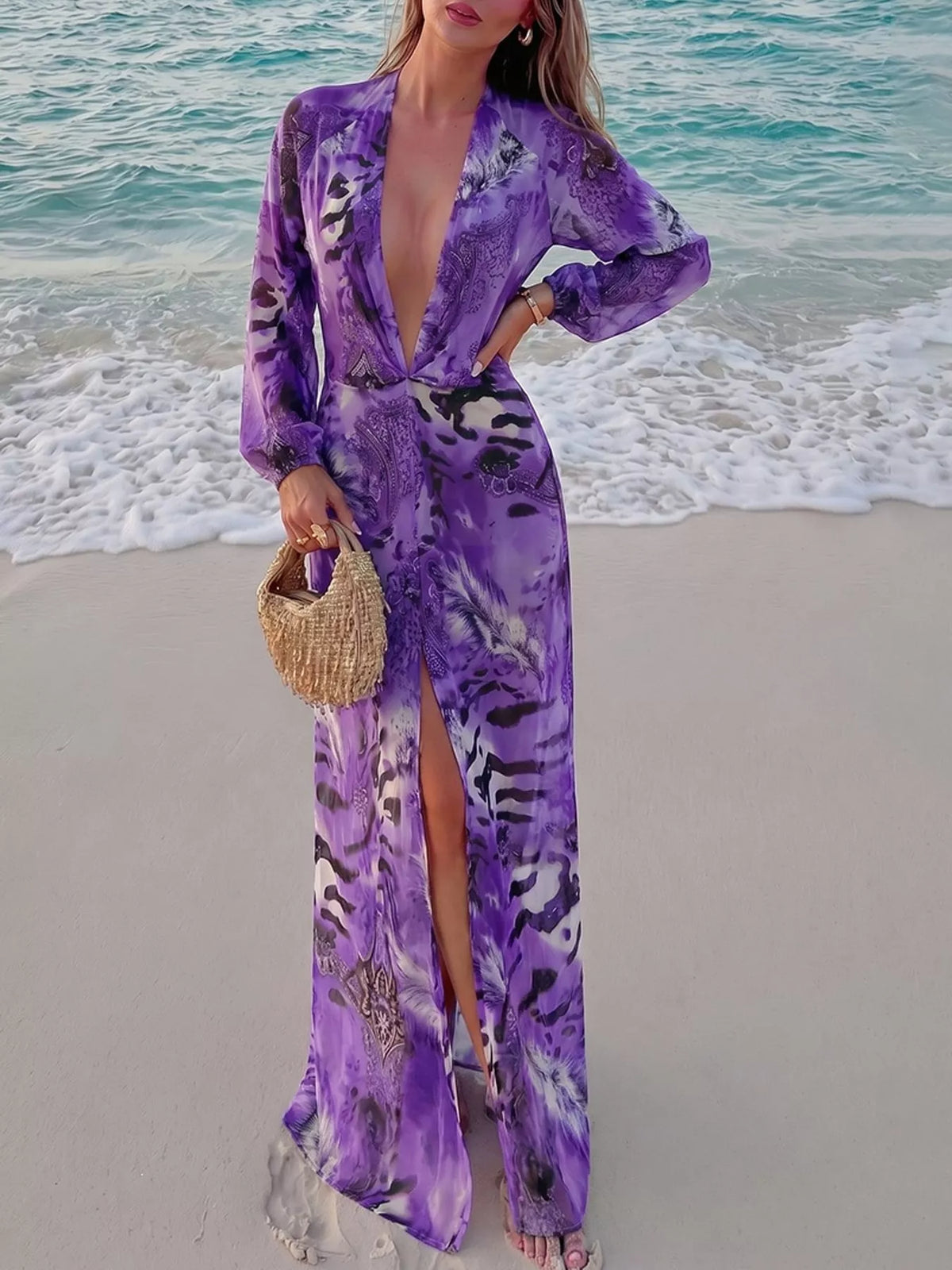 Purple printed flowy maxi dress with deep V neckline, long sleeves, side slit