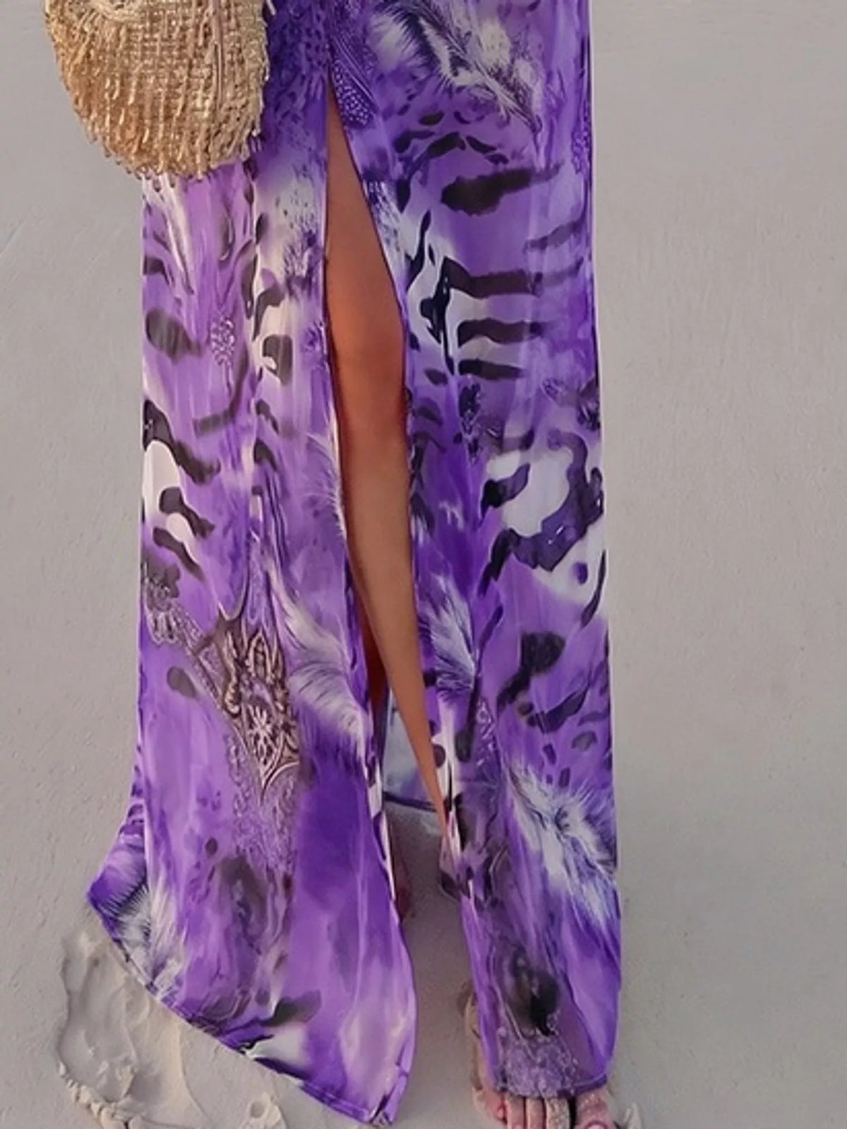 Purple printed maxi dress with open front slit and deep V-neck
