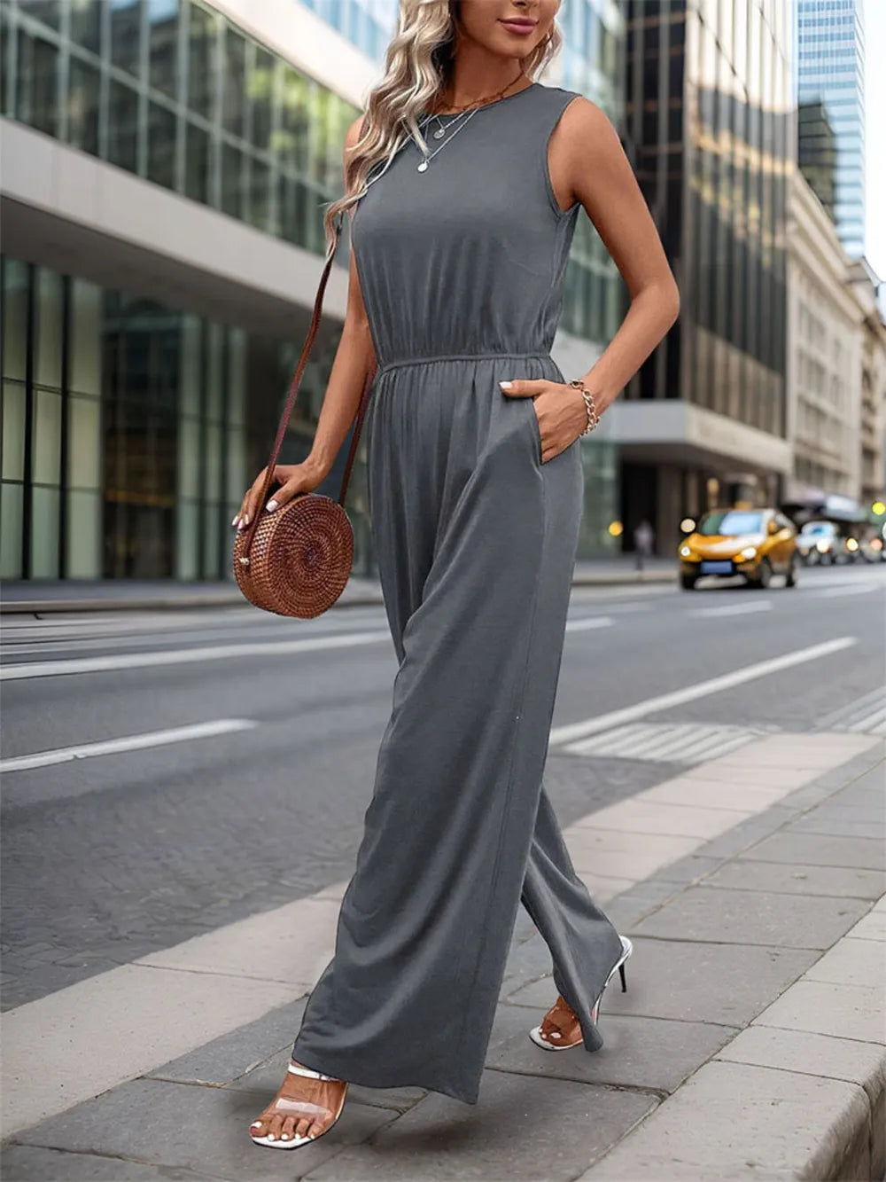 Dark gray round neck wide-leg jumpsuit, sleeveless and relaxed wide-leg fit