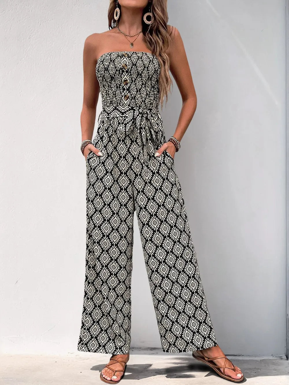 Black and white printed smocked sleeveless jumpsuit with wide-leg, tied waist