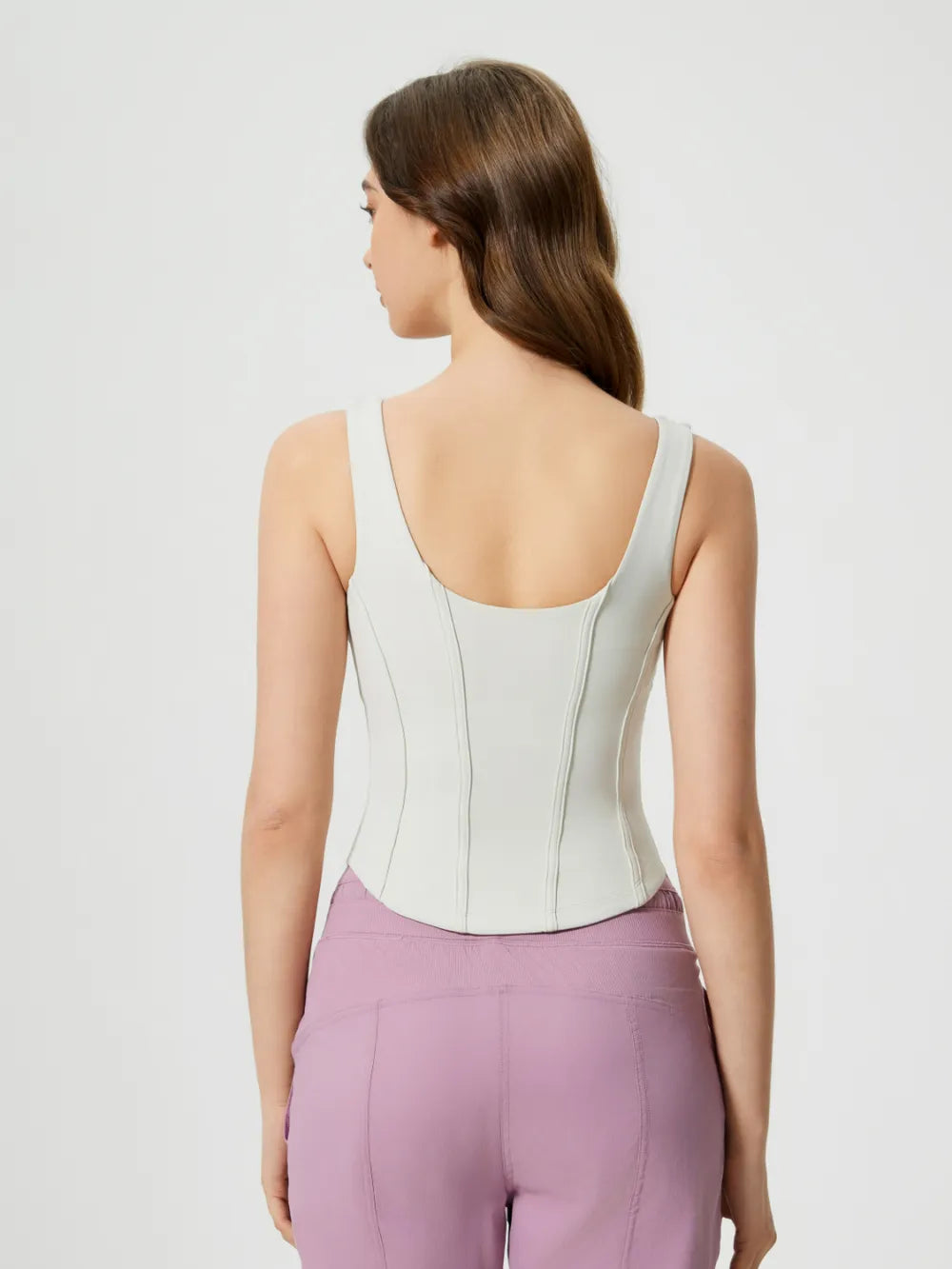 White active tank with wide back straps and stitched seam details