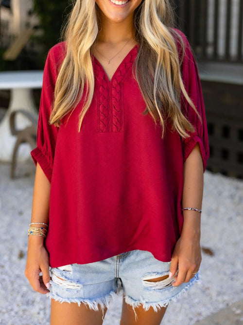 Deep red half-sleeve blouse with V-neck and braided embroidery front