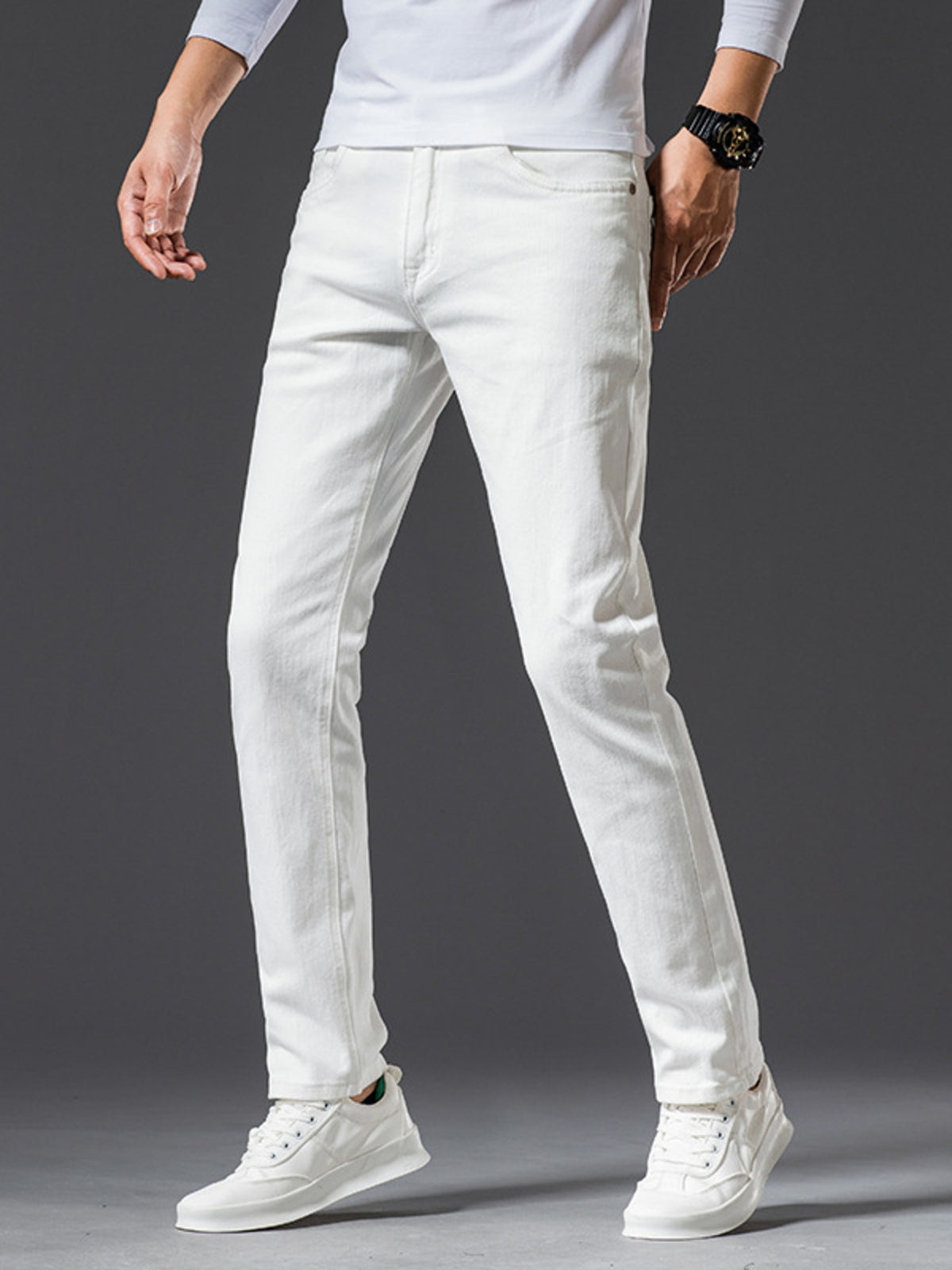 White slim-fit stretch cotton jeans, straight leg style, zip fly and front pockets